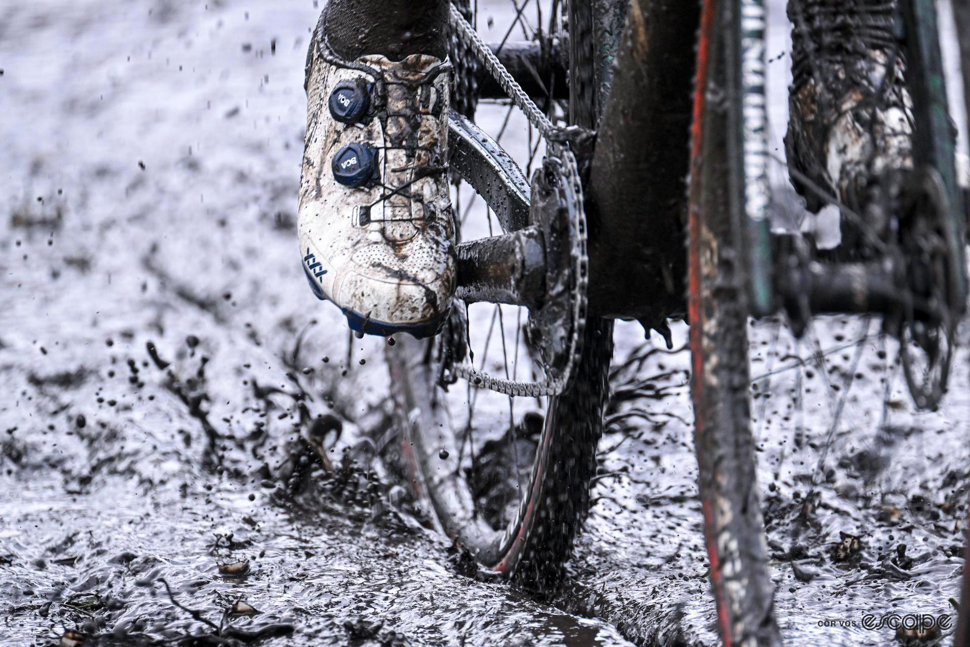 Action close-up of a very muddy cyclocross bike during Exact Cross Loenhout Azencross.