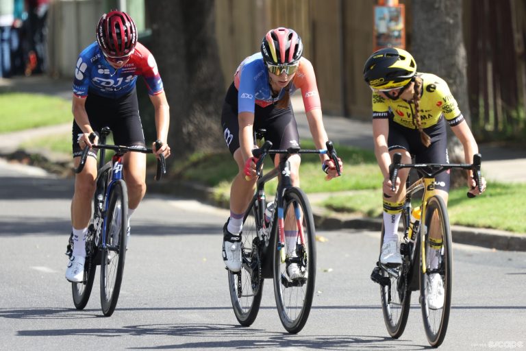 Rosita Reijnhout looks over her shoulder at Dominika Wlodarczyk and Cecilie Uttrup Ludwig as they race down a road in Geelong, Australia