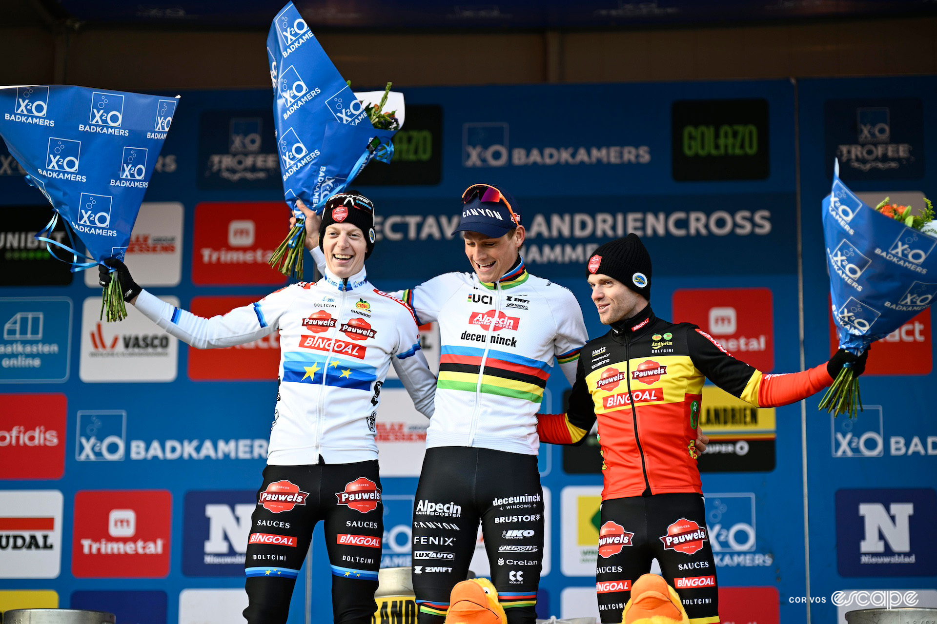 Winner Mathieu van der Poel shares a laugh with second-place Michael Vanthourenhout and and third Eli Iserbyt on the elite men's podium at X2O Trofee Hamme - Flandriencross.