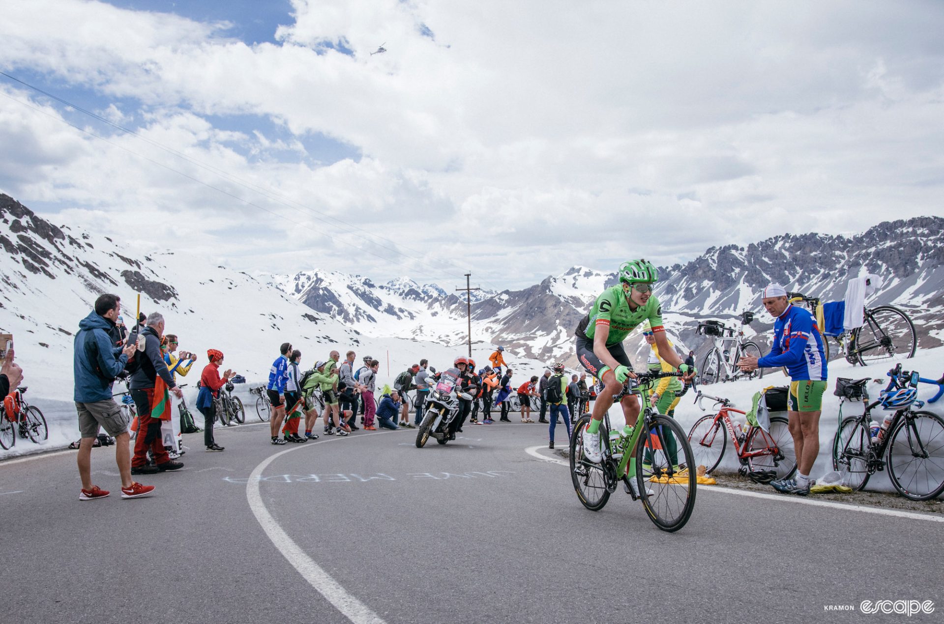Joe Dombrowski climbs a snowy pass solo in the Giro d'Italia.