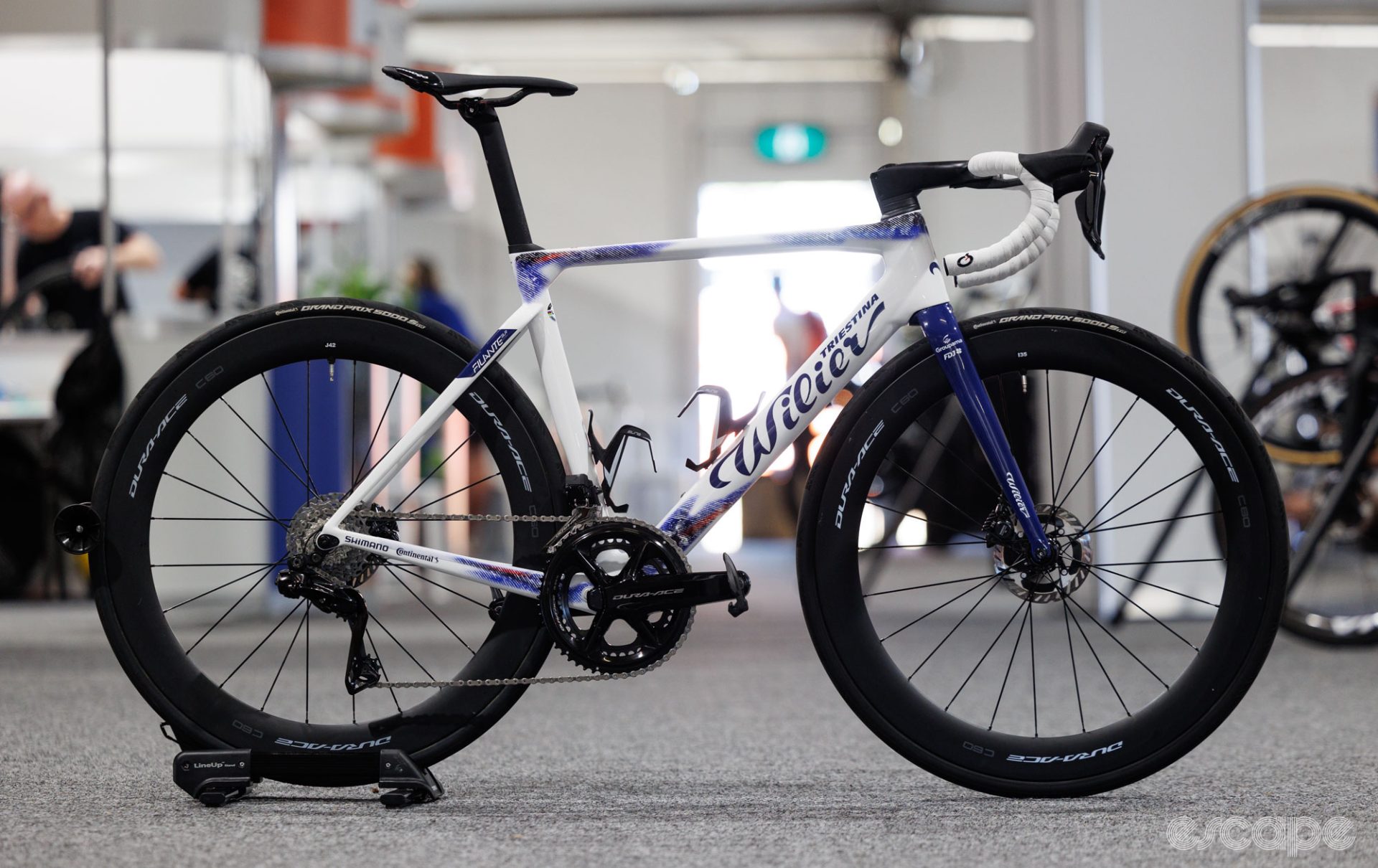 The white Wilier of Groupama-FDJ features blue accents and a fork. It's a soup-to-nuts Dura-Ace build.