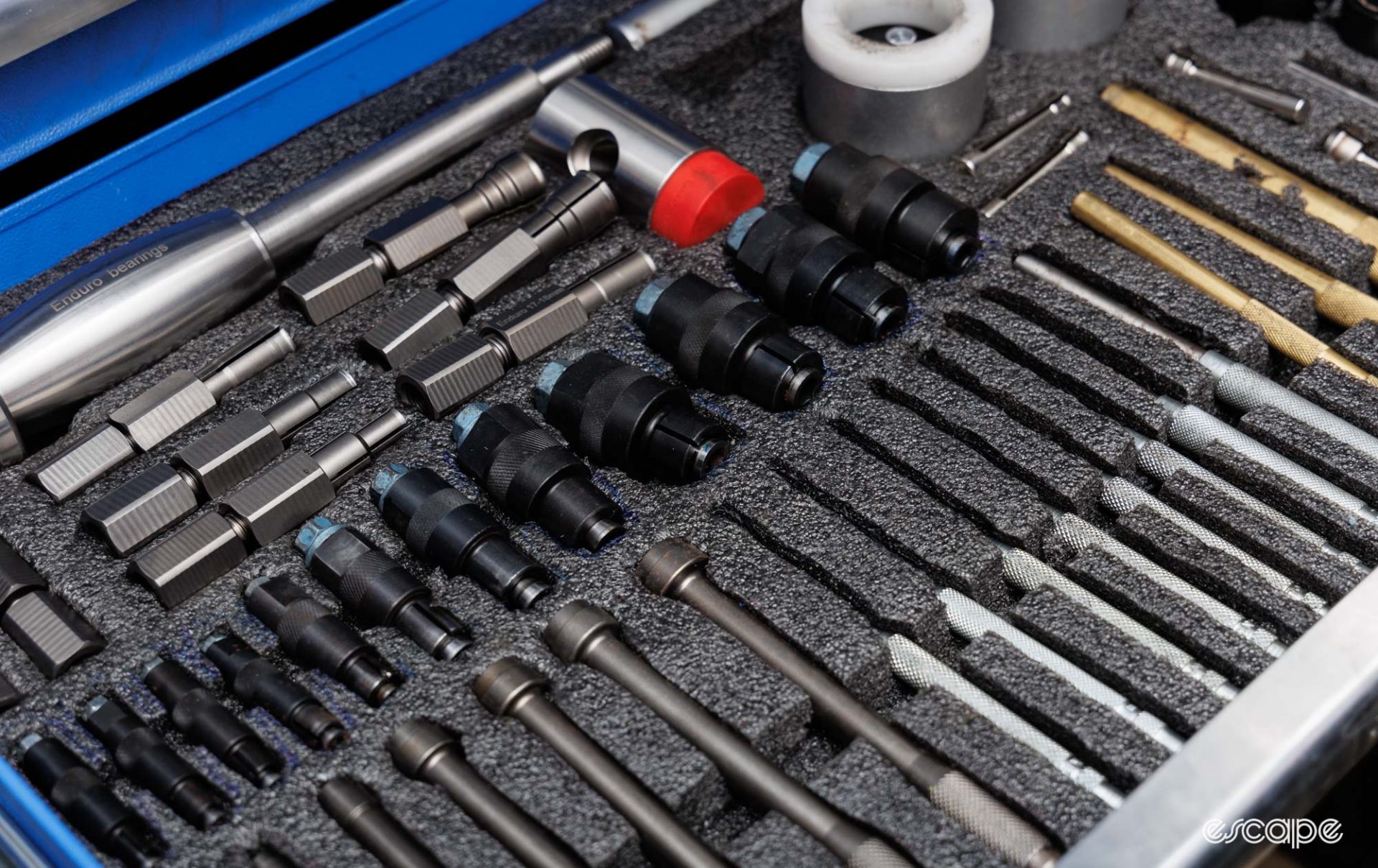 A foam organised tool drawer with a variety of specialist bearing removal tools. 