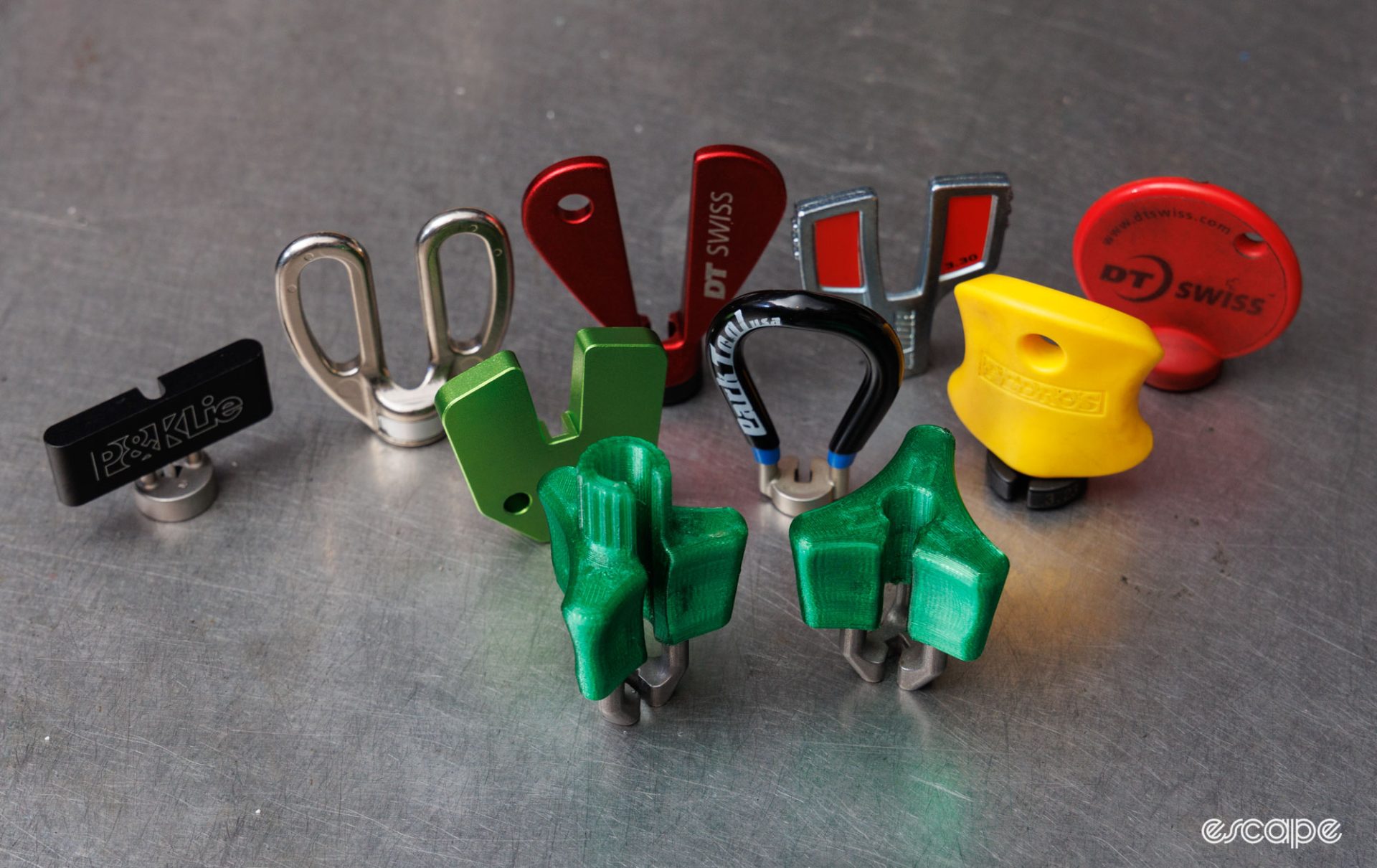 An assortment of premium spoke wrenches with the new Monolith tools at the front. 