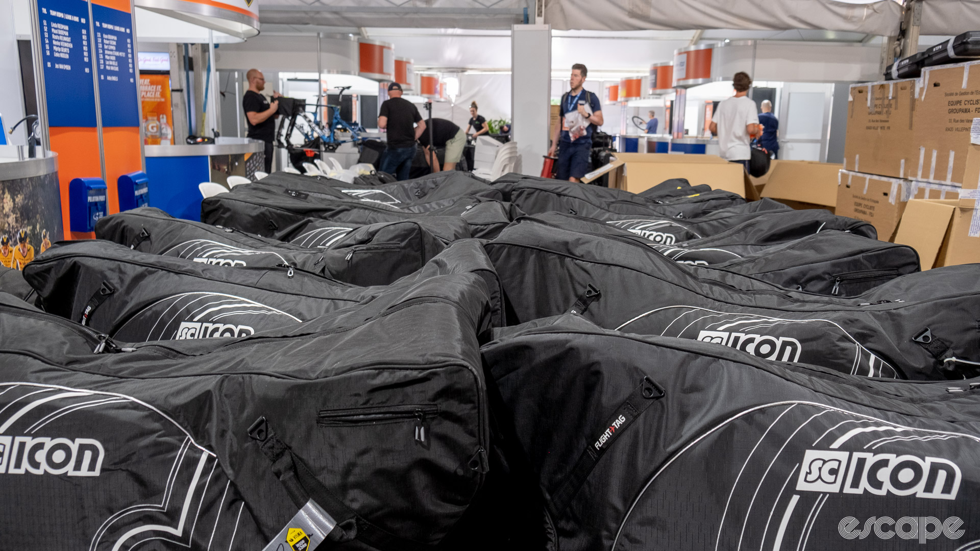 The photo shows bike bags ready to leave the Tour Down Under