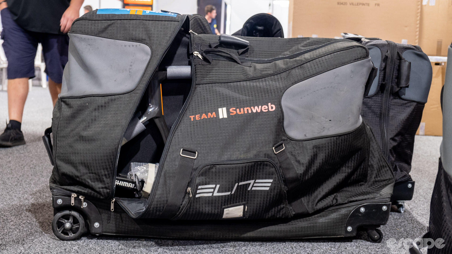 The photo shows a bike bag with a Team Sunweb logo on the side. 