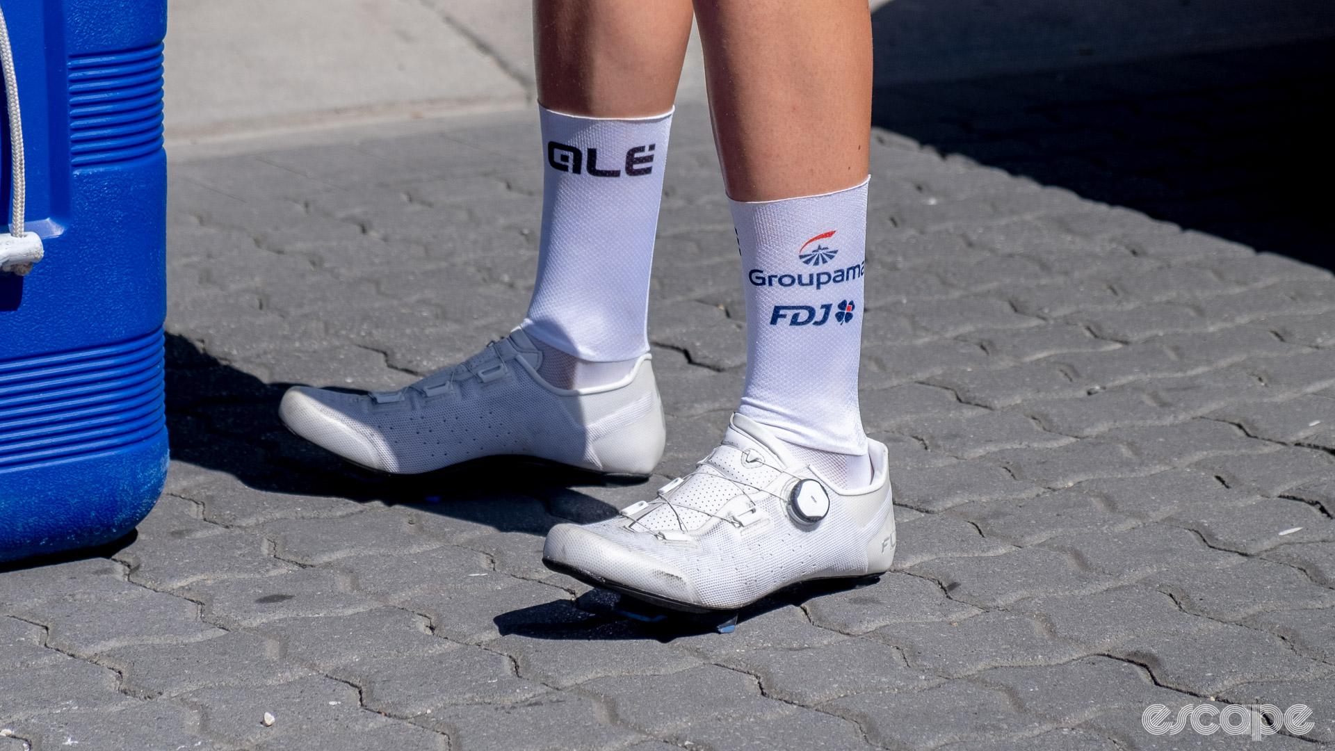 The photo shows FLR cycling shoes