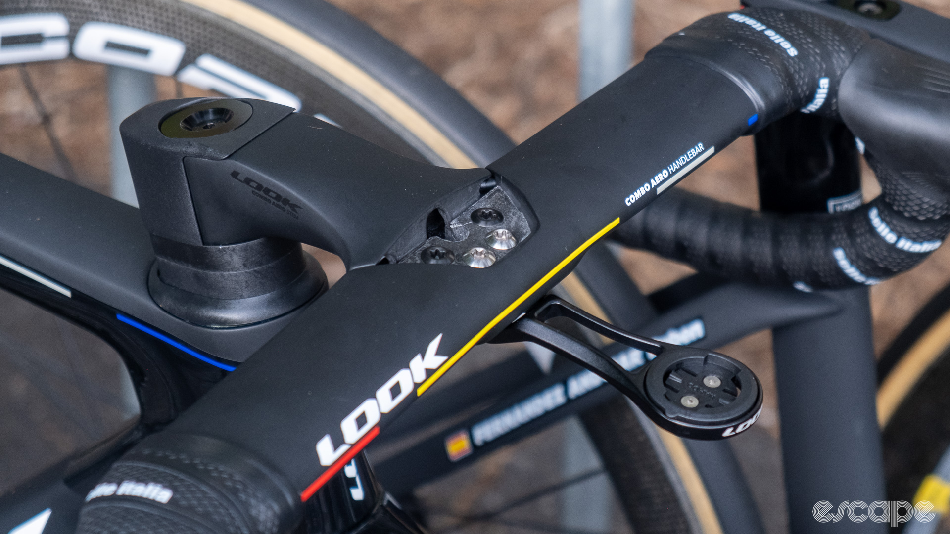 The photo shows the handlebars on a Team Cofidis' Look 795 Blade RS missing its top cap.