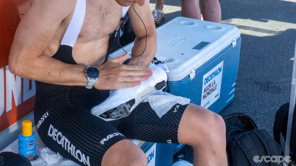 The photo shows Franck Bonnamour cleaning his shoes with a baby wipe.