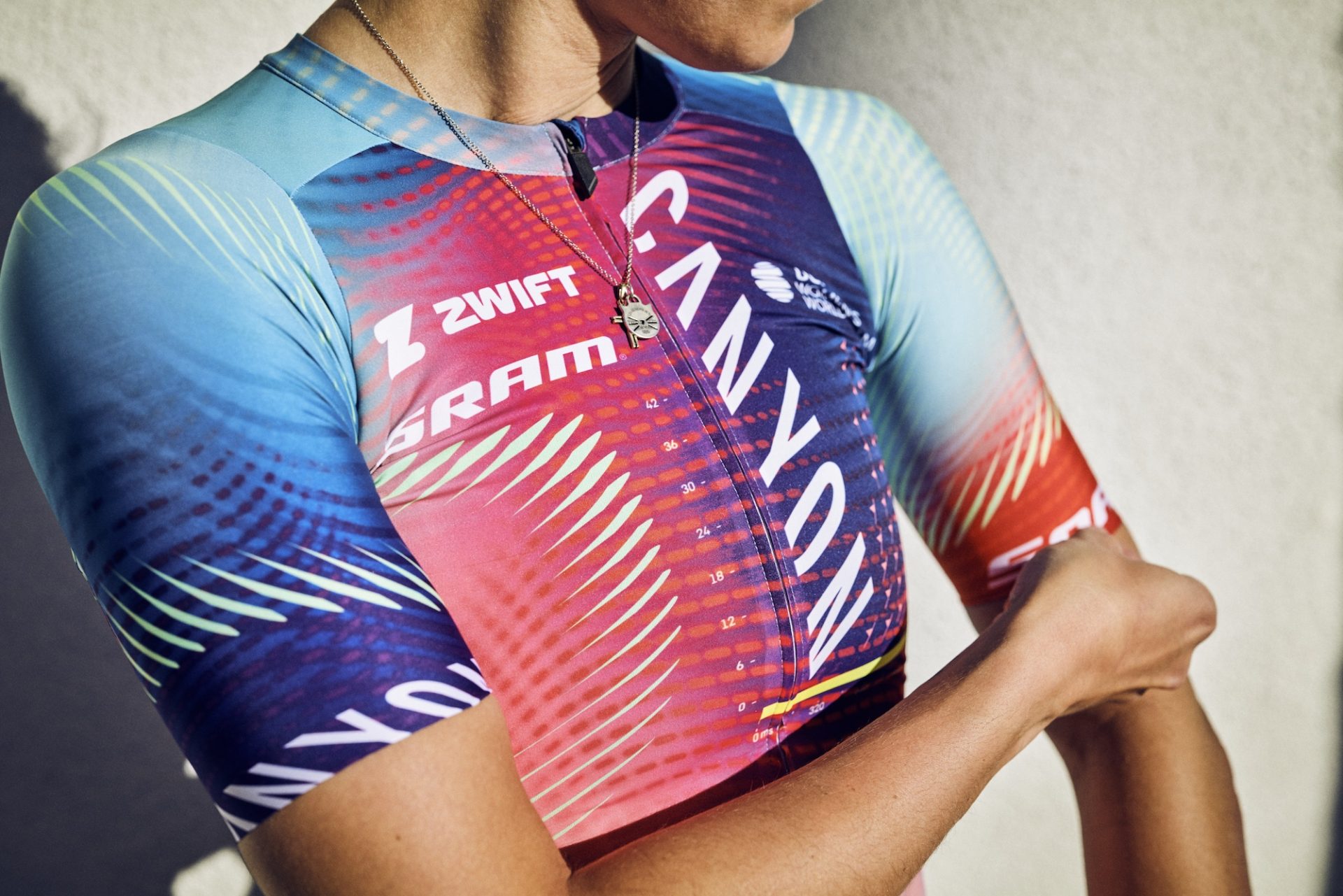 A close up of Canyon-SRAM's New Jersey, showing the geometric patterns of white that break up what would be solid color blocks. The design has a kind of fractal-geometry appearance to it.