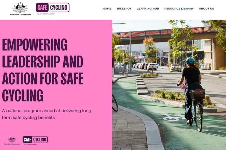 Image of cyclist on green bike path, with tagline in pink: "empowering leadership and action for safe cycling"