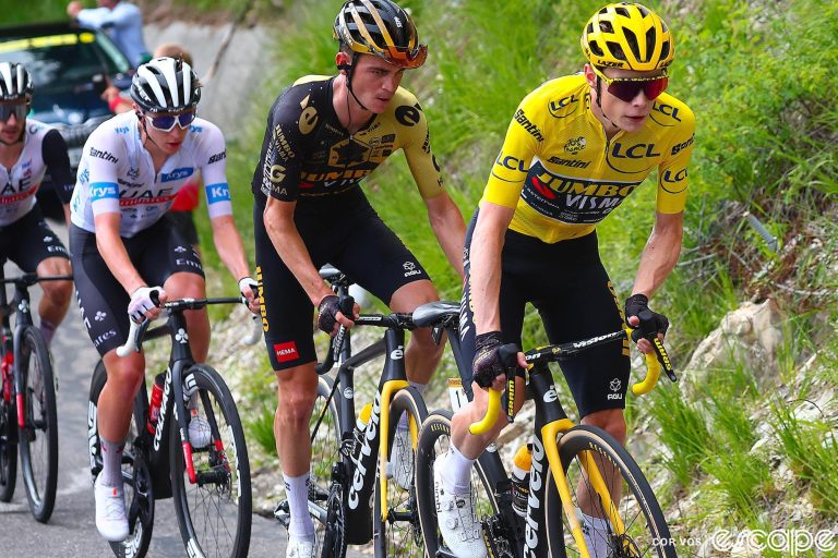 Jonas Vingegaard, in the yellow jersey, leads teammate Sepp Kuss and rival Tadej Pogačar on a climb at the 2023 Tour de France.