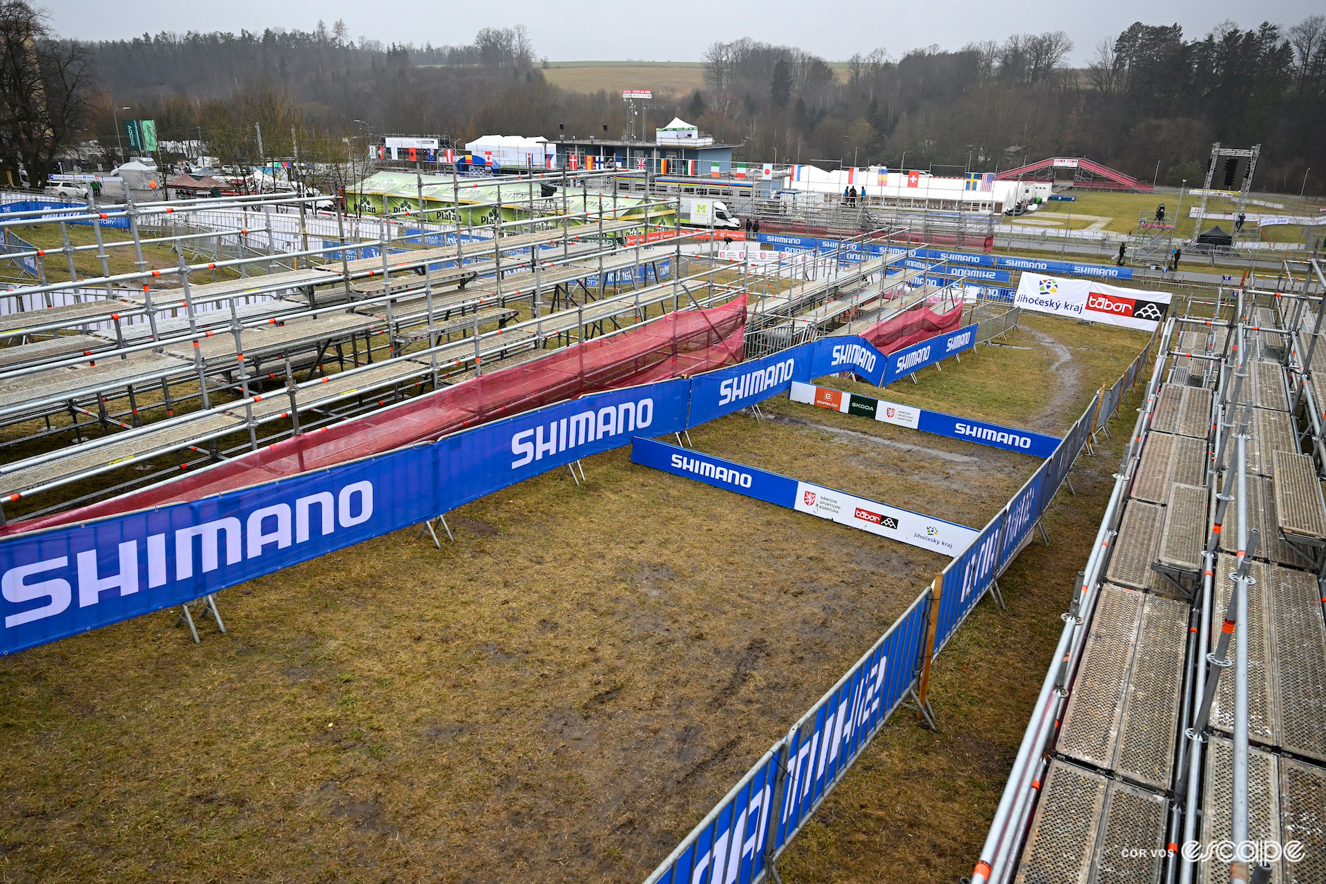A pre-event photo showing the planks flanked by spectator stands, one of the key features of the Tábor course for the 2024 Cyclocross World Championships.