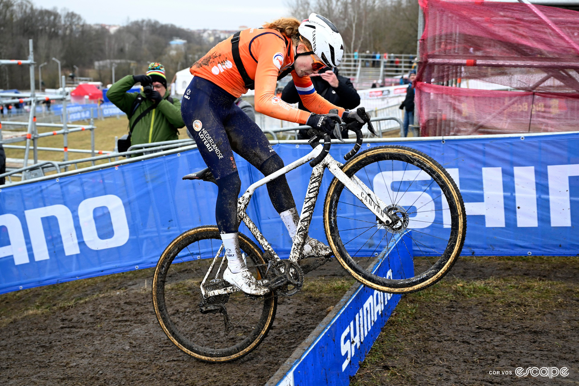 Dutch rider Puck Pieterse hops the planks during recon of the 2024 Cyclo-Cross World Championships in Tábor.