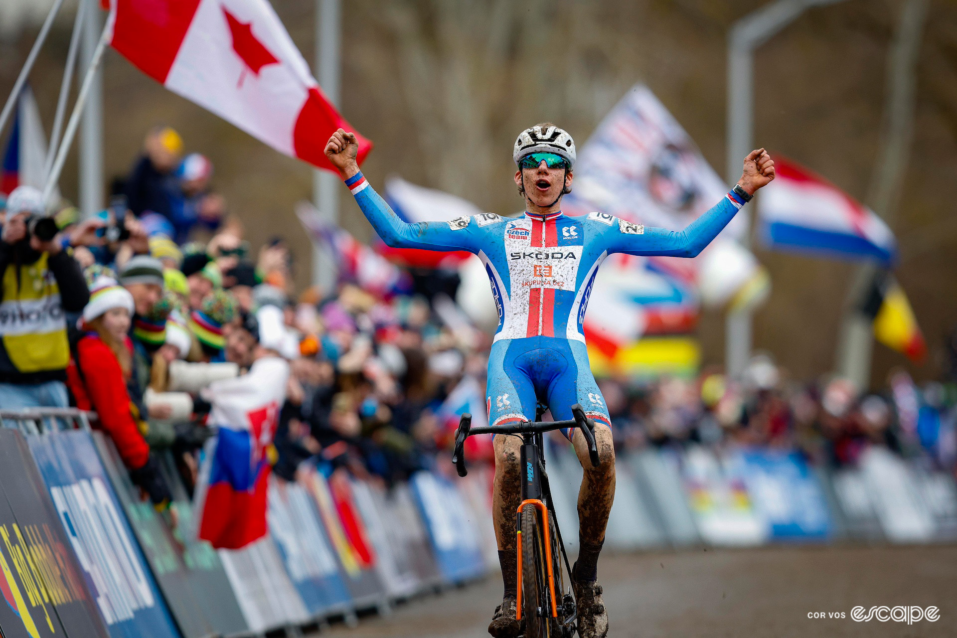 Czech junior rider Kryštof Bažant celebrates winning the bronze medal on the finishing straight in front of an enthusiastic home crowd at the 2024 Cyclocross World Championships in Tábor.