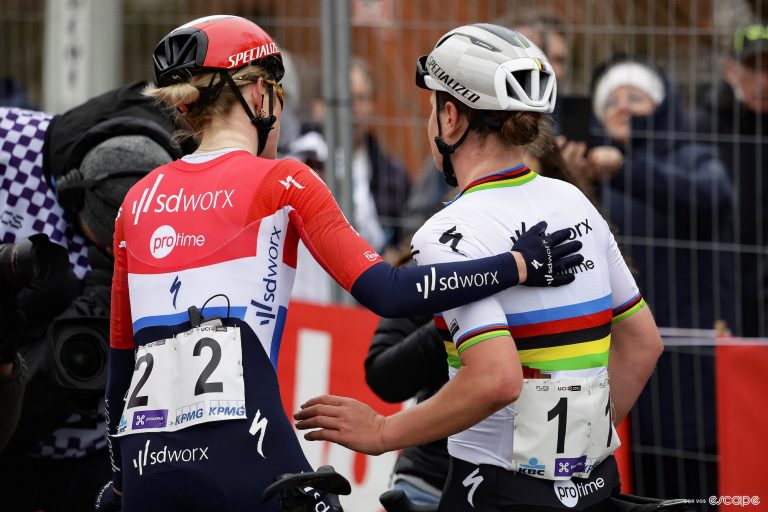Kopecky and Vollering embrace after a bike race