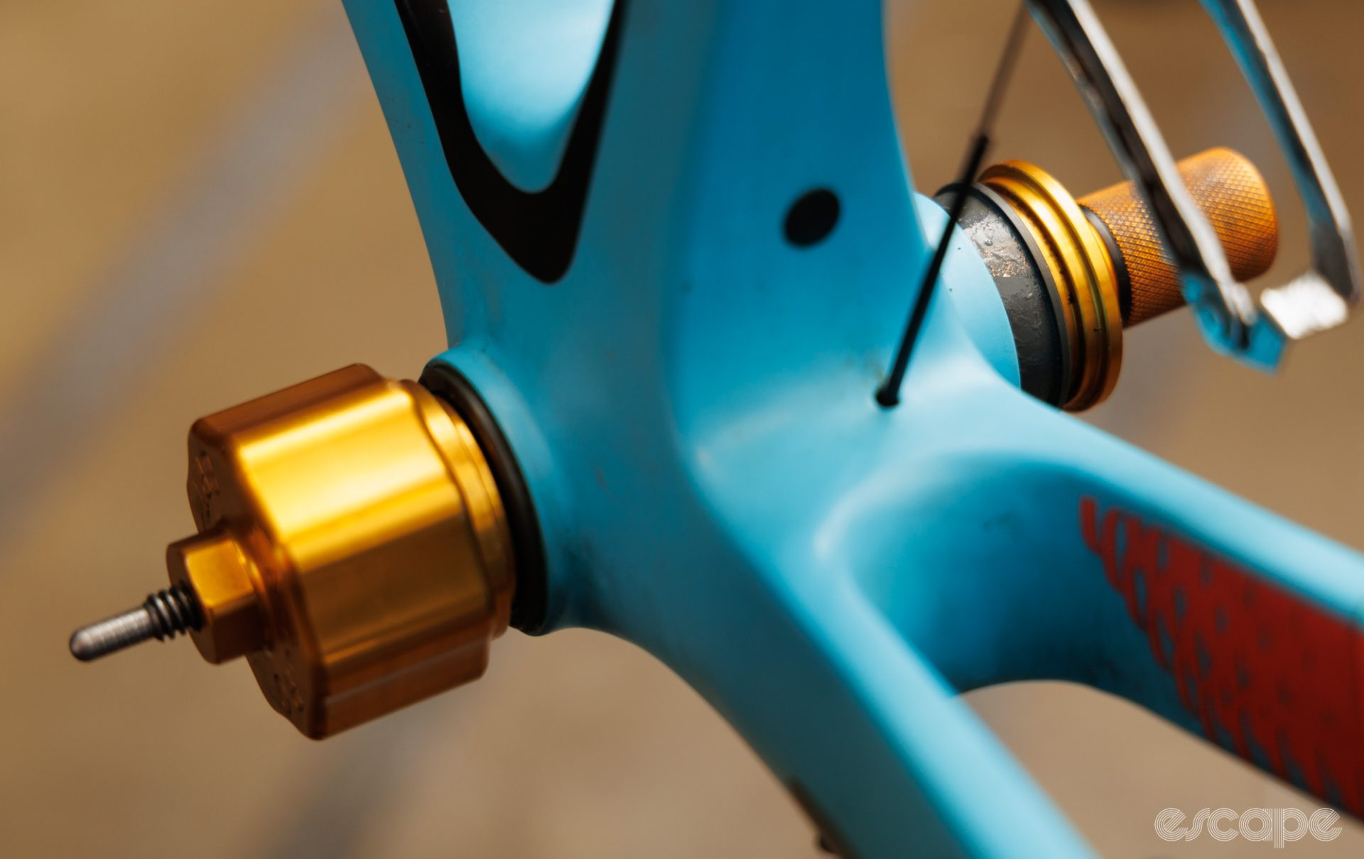 A Shimano press-fit bottom bracket is installed into a Giant bicycle. A gold-coloured Enduro tool is used. 