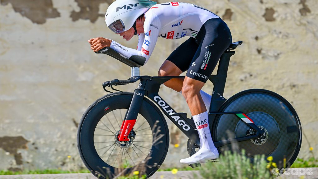 The photo shows Isaac Del Toro of UAE Team Emirates in a time trial position. 