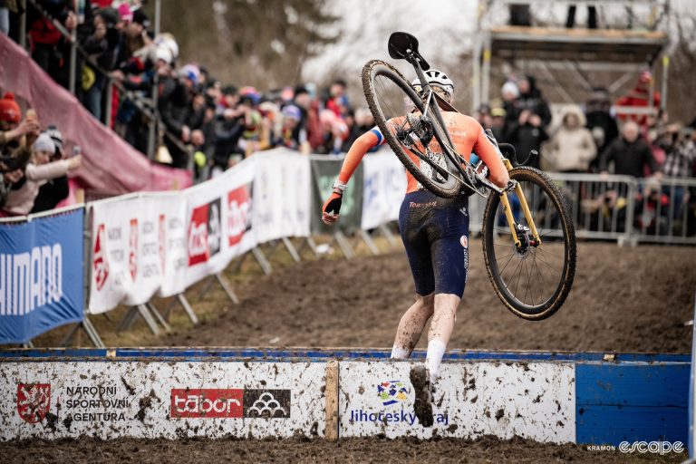 Dutch rider Fem van Empel takes the planks on foot during the 2024 Cyclocross World Championships in Tábor.