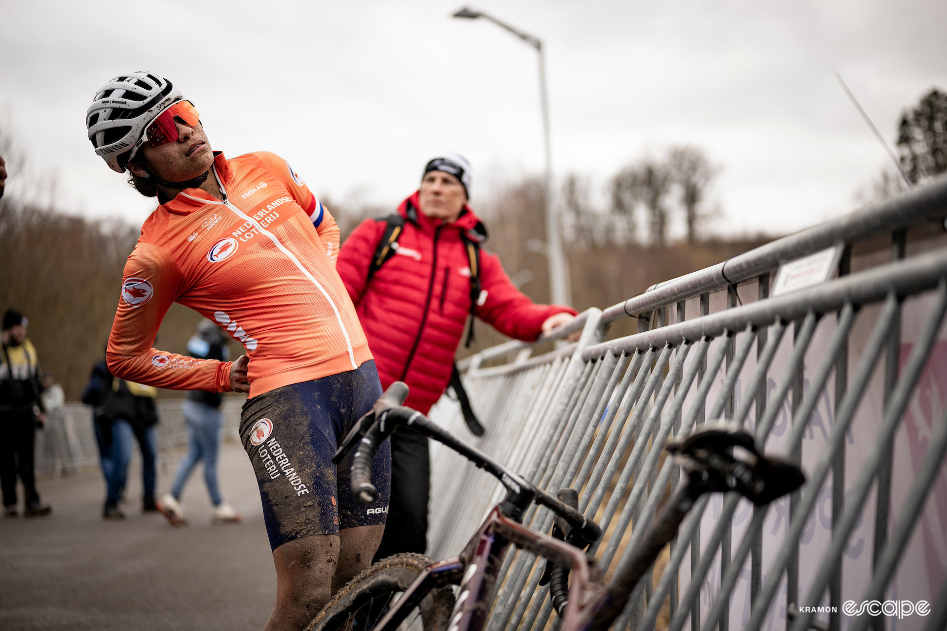Dutch rider Ceylin del Carmen Alvarado stretches her back after finishing just off the podium at the 2024 Cyclocross World Championships in Tábor.