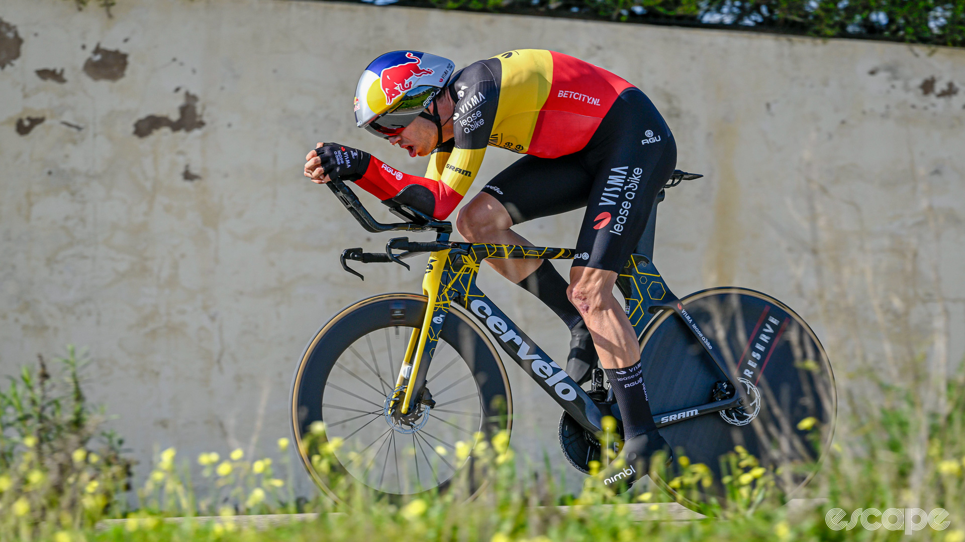 The image shows Wout van Aert time trialling.