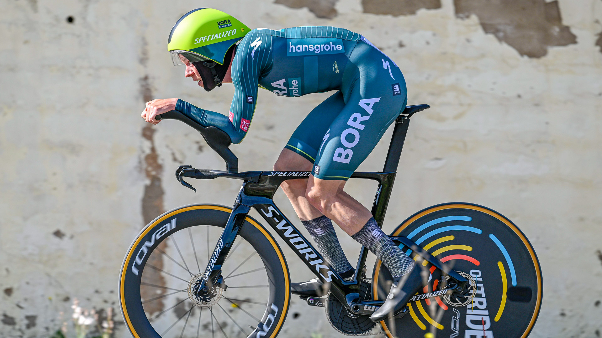The photo shows Bob Jungels of BORA - Hansgrohe time trialling at the Volta Algarve.