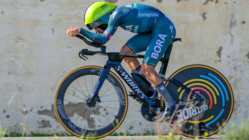 The image shows Sergio Higuita of Bora - Hansgrohe time trialling at the Volta Algarve. 