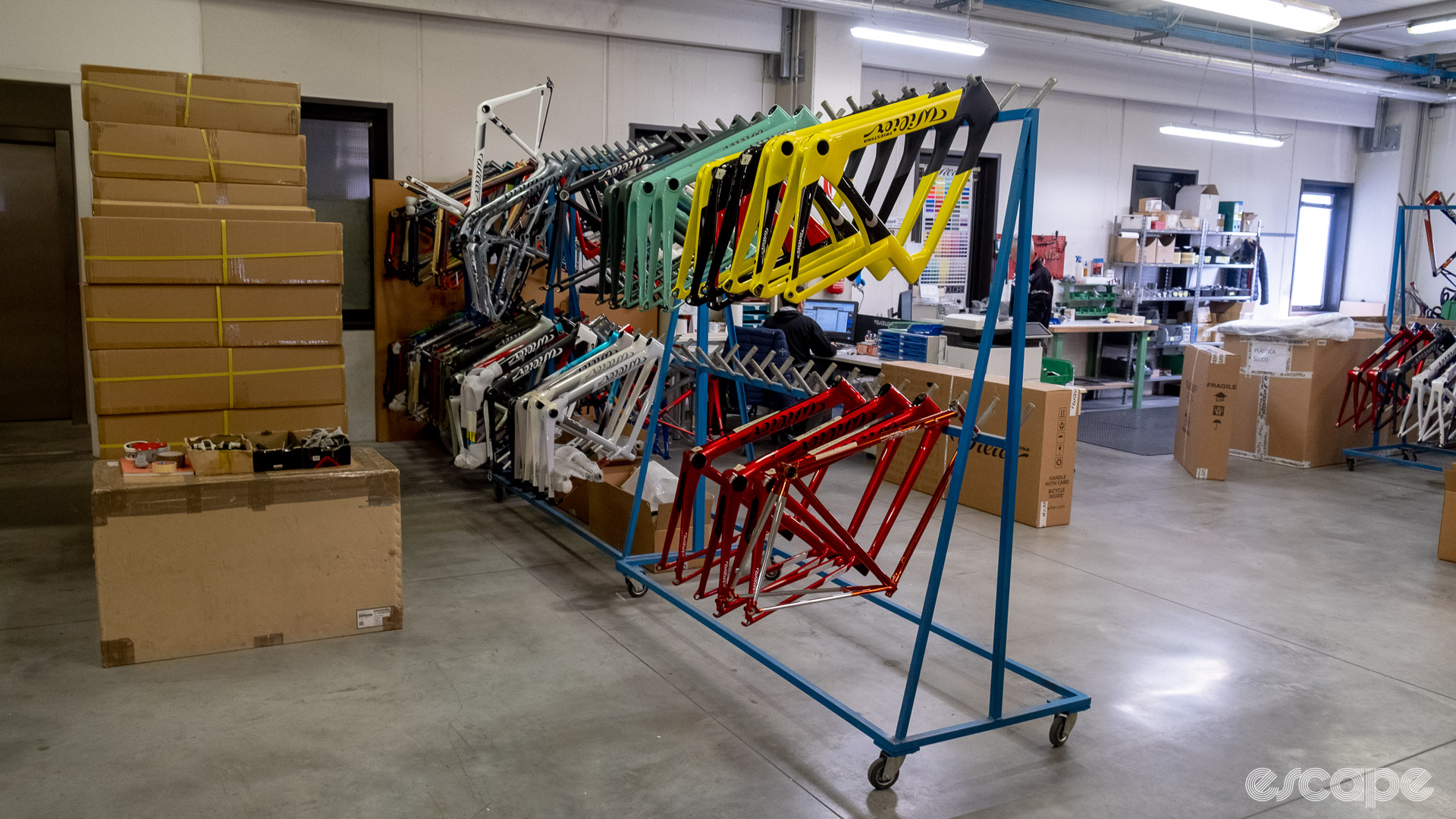 The photo shows a trolley with Wilier frames awaiting their build at the assembly line 