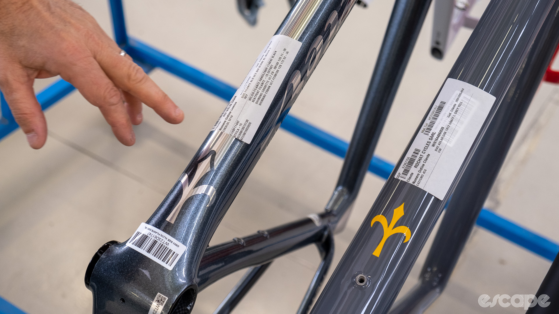 The photo shows a sticker and bar code on the down tube of a frame that make up part of Wilier's tagging system for bike builds on its assembly line 
