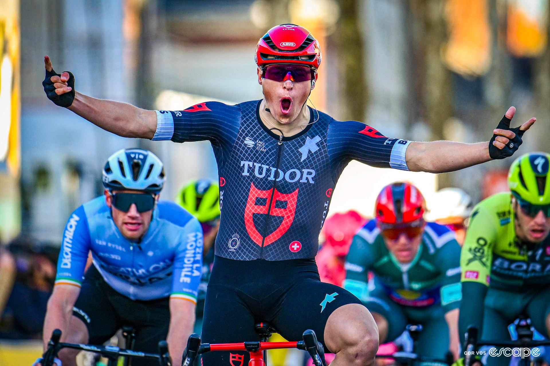 Arvid de Kleijn celebrating victory on stage 1 of Paris-Nice 2024.