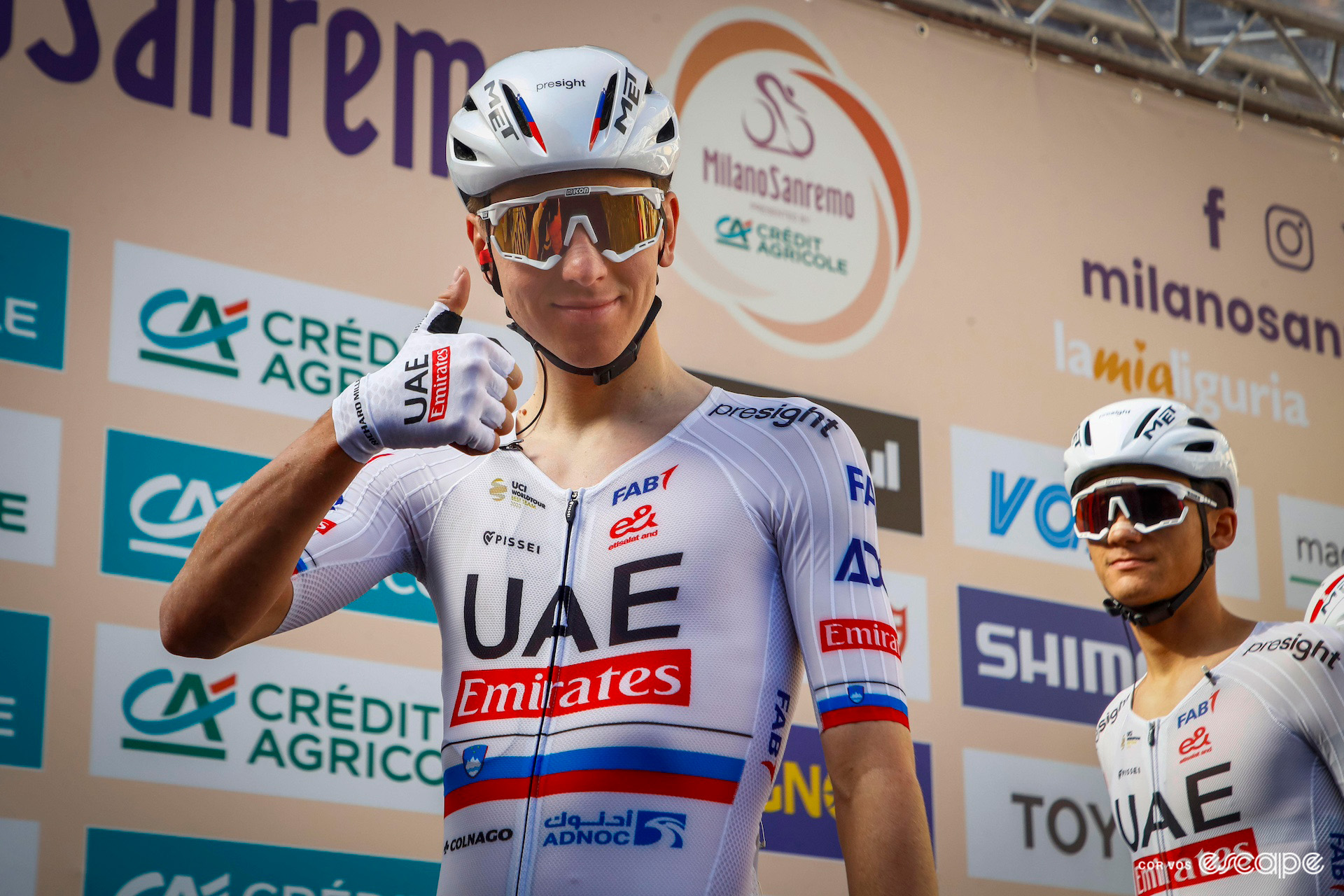 Tadej Pogačar gives a thumbs up from sign-on before Milan-San Remo 2024.