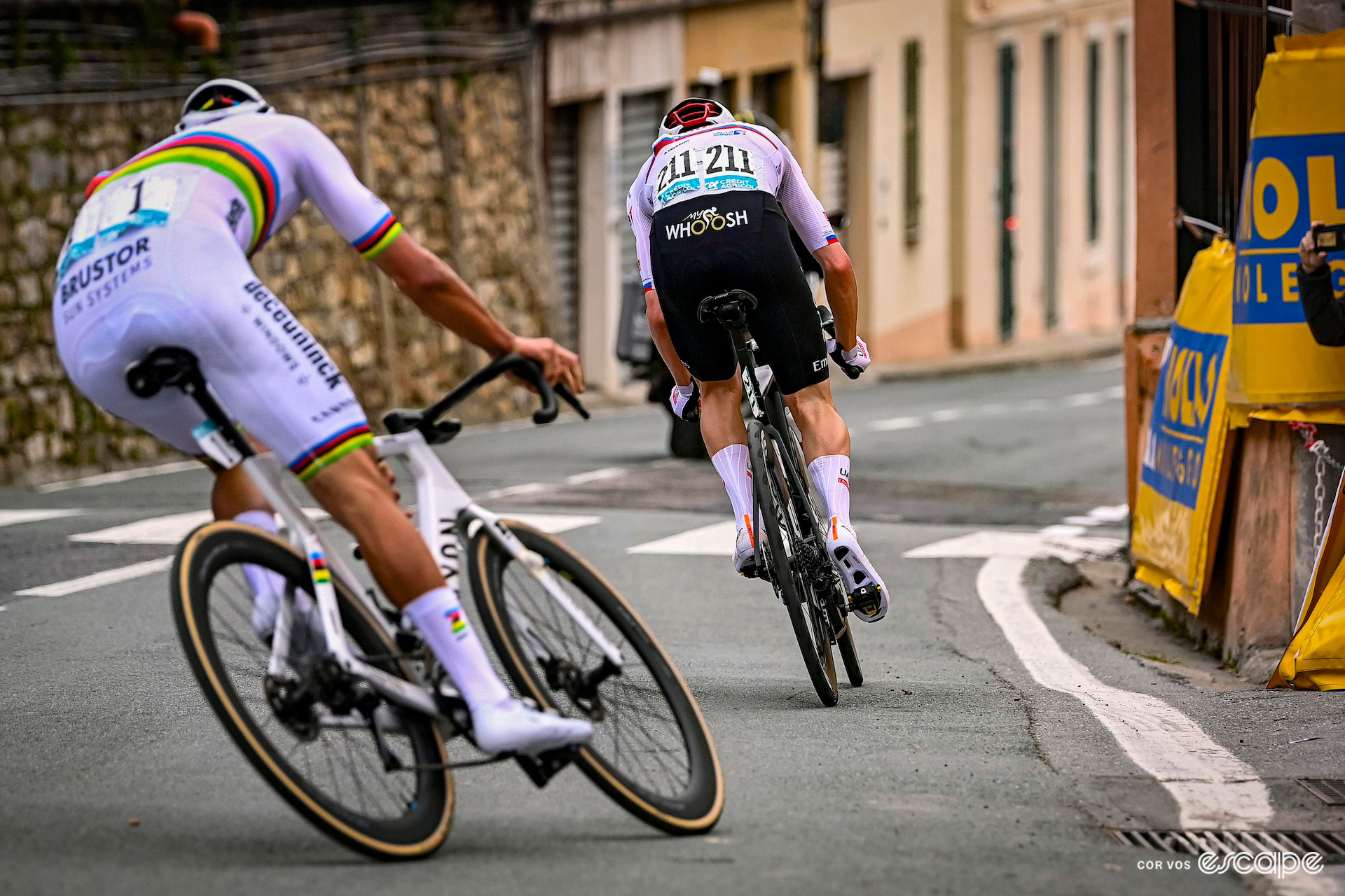 Tadej Pogačar leads Mathieu van der Poel onto the descent off the Poggio during Milan-San Remo 2024.