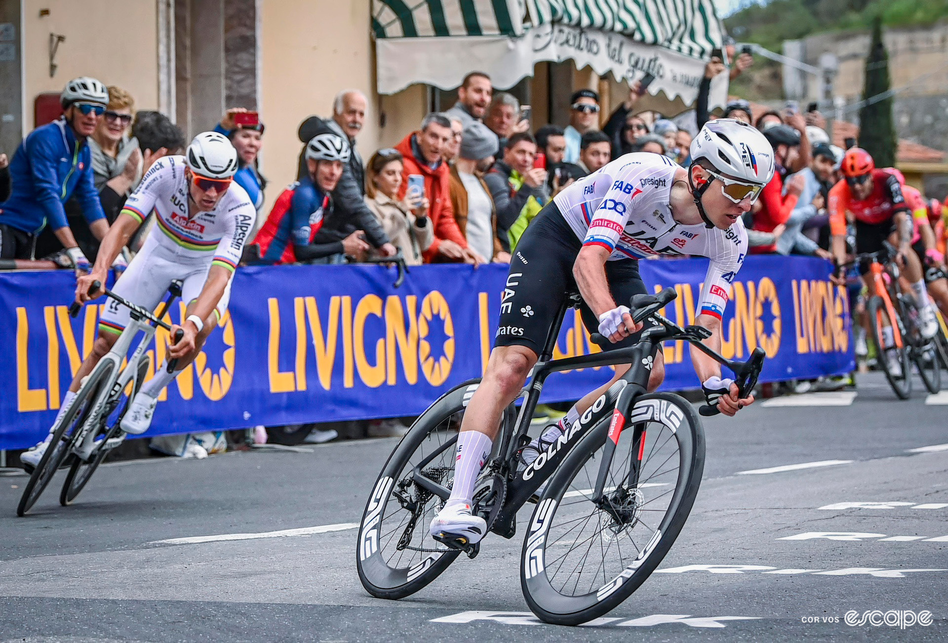 Tadej Pogačar leads Mathieu van der Poel during Milan-San Remo 2024.