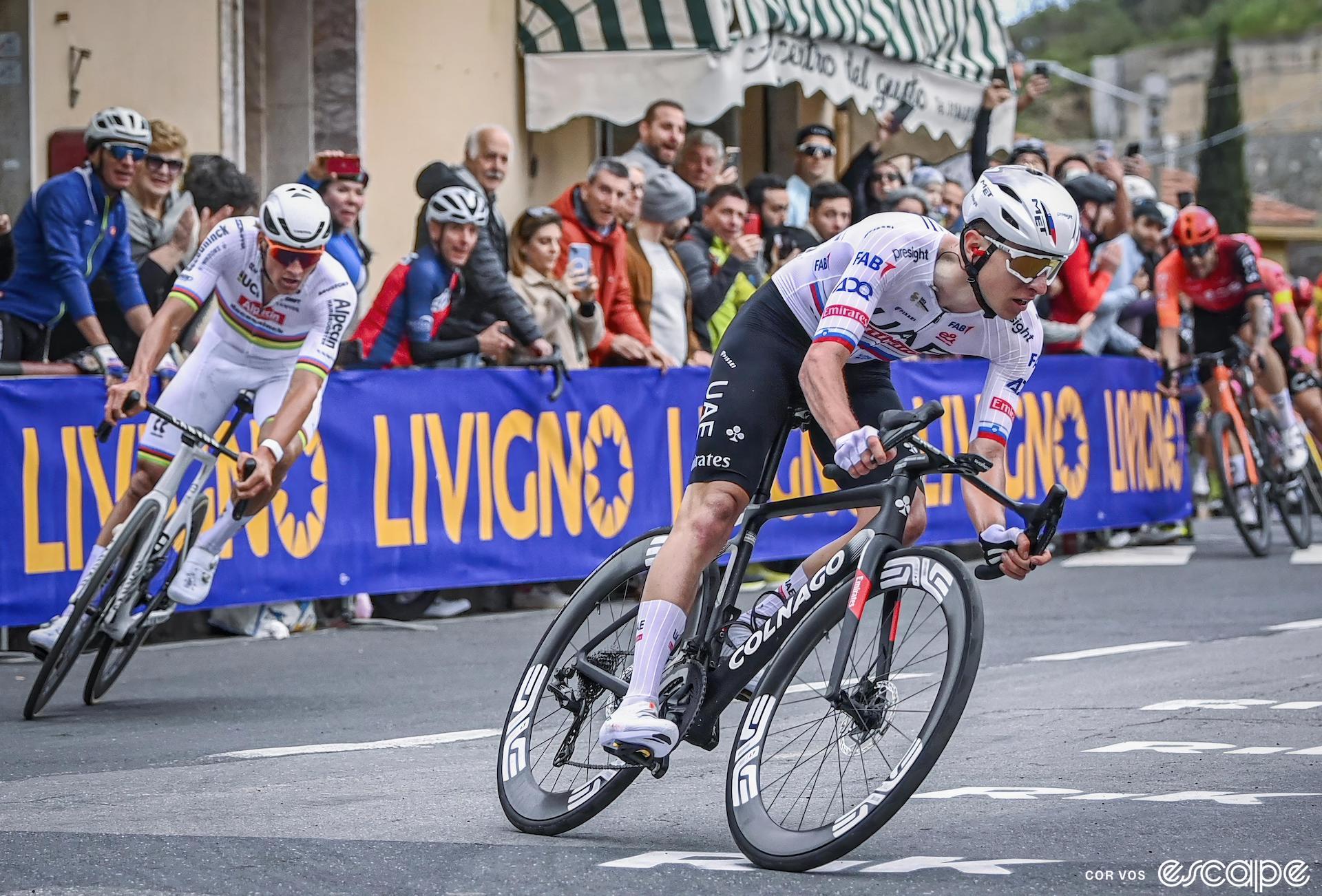 Mathieu van der Poel follows Tadej Pogačar over the summit of the Poggio climb in the 2024 Milan-San Remo.