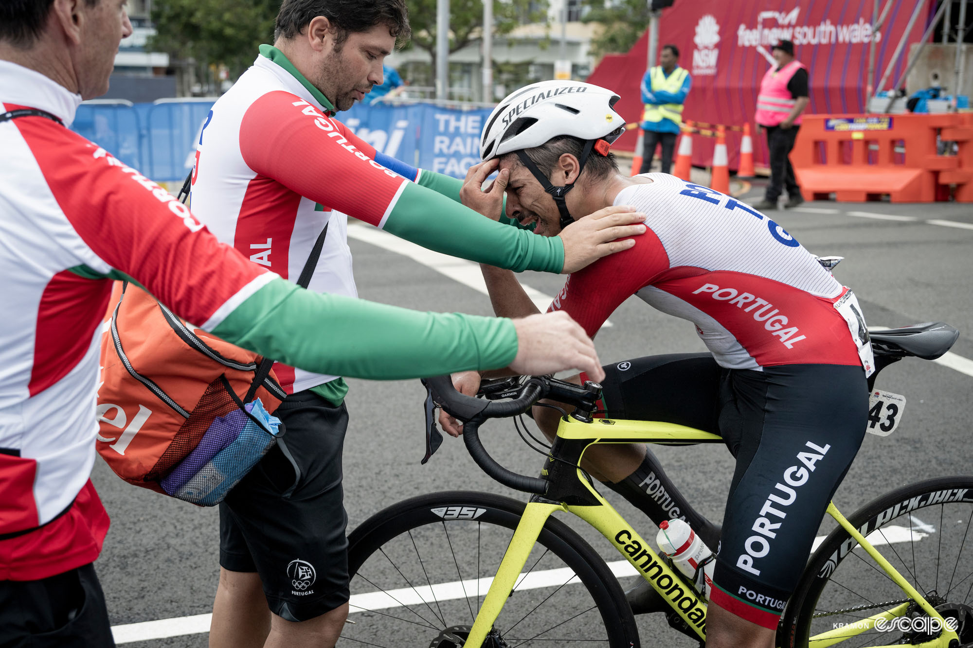 António Morgado sobs, his head in his hands, comforted by a Portugal team soigneur. 