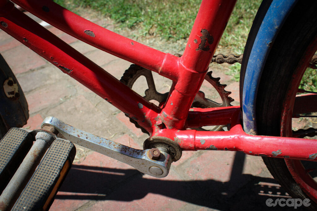 Detail shot of a bottom bracket area on the old red bike. 