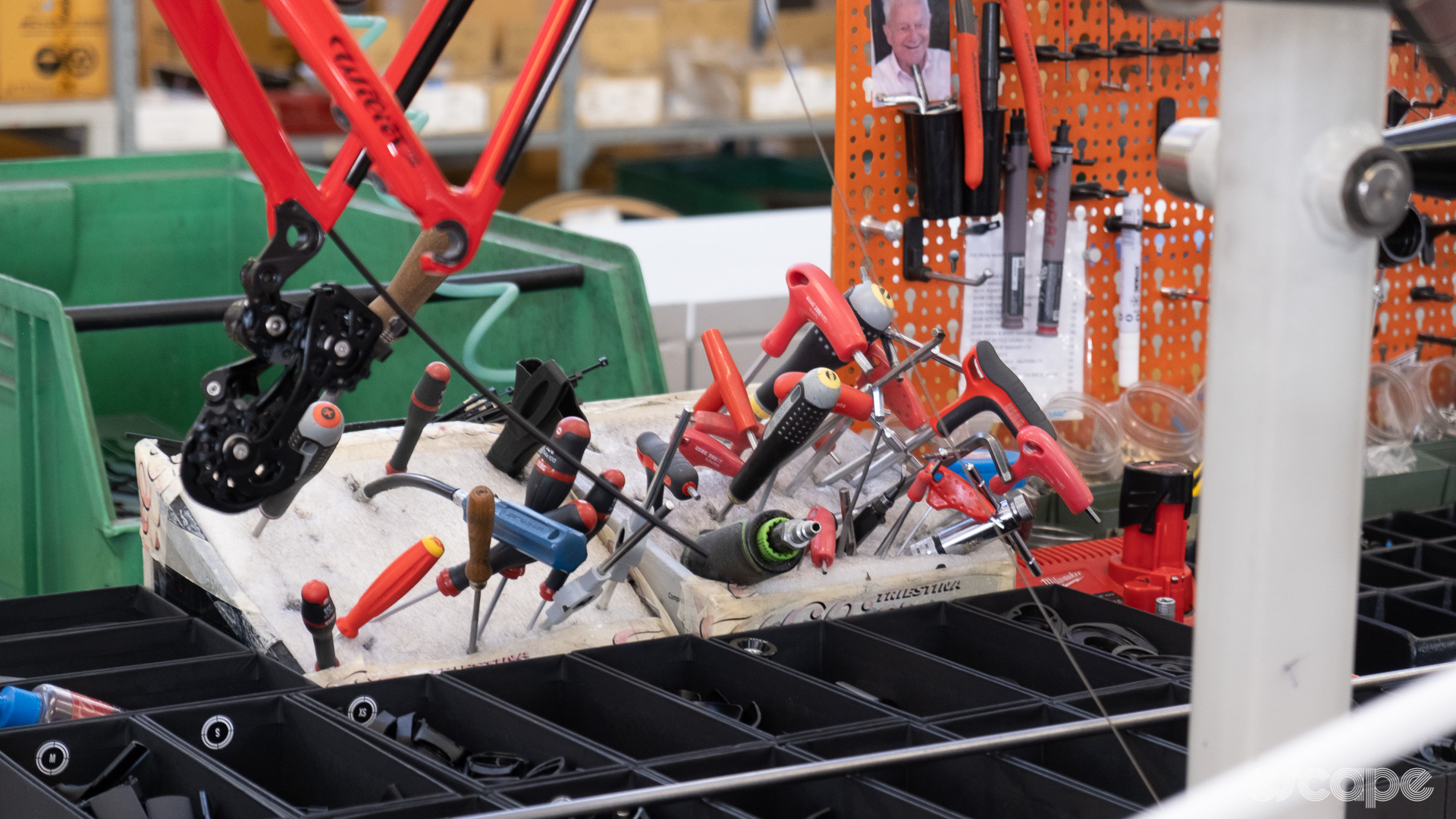 The photo shows some tools stuck into some polystyrene foam at a station on Wilier's assembly line 