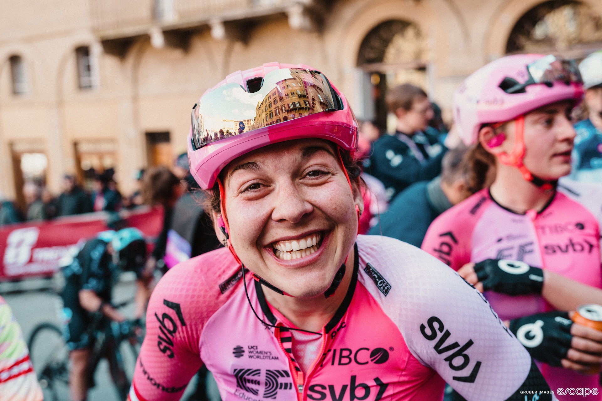 Alison Jackson has a wide smile from the camera after the 2023 Strade Bianche.