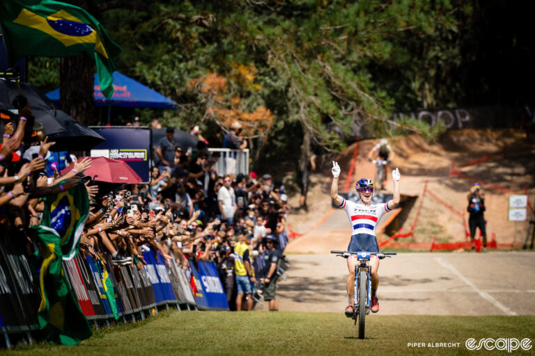 Evie Richards celebrates as she wins the XCC at the season-opening 2024 World Cup round in Mairiporã, Brazil.