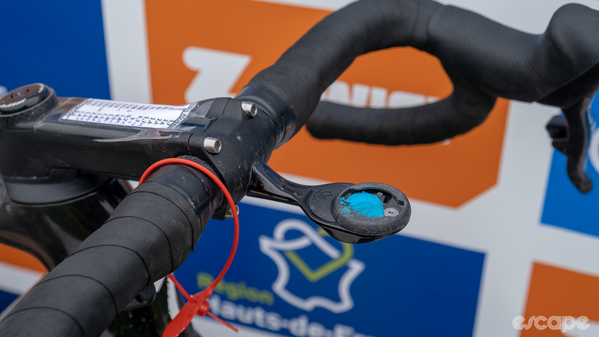 The image shows the tops of Kopecky's handlebars