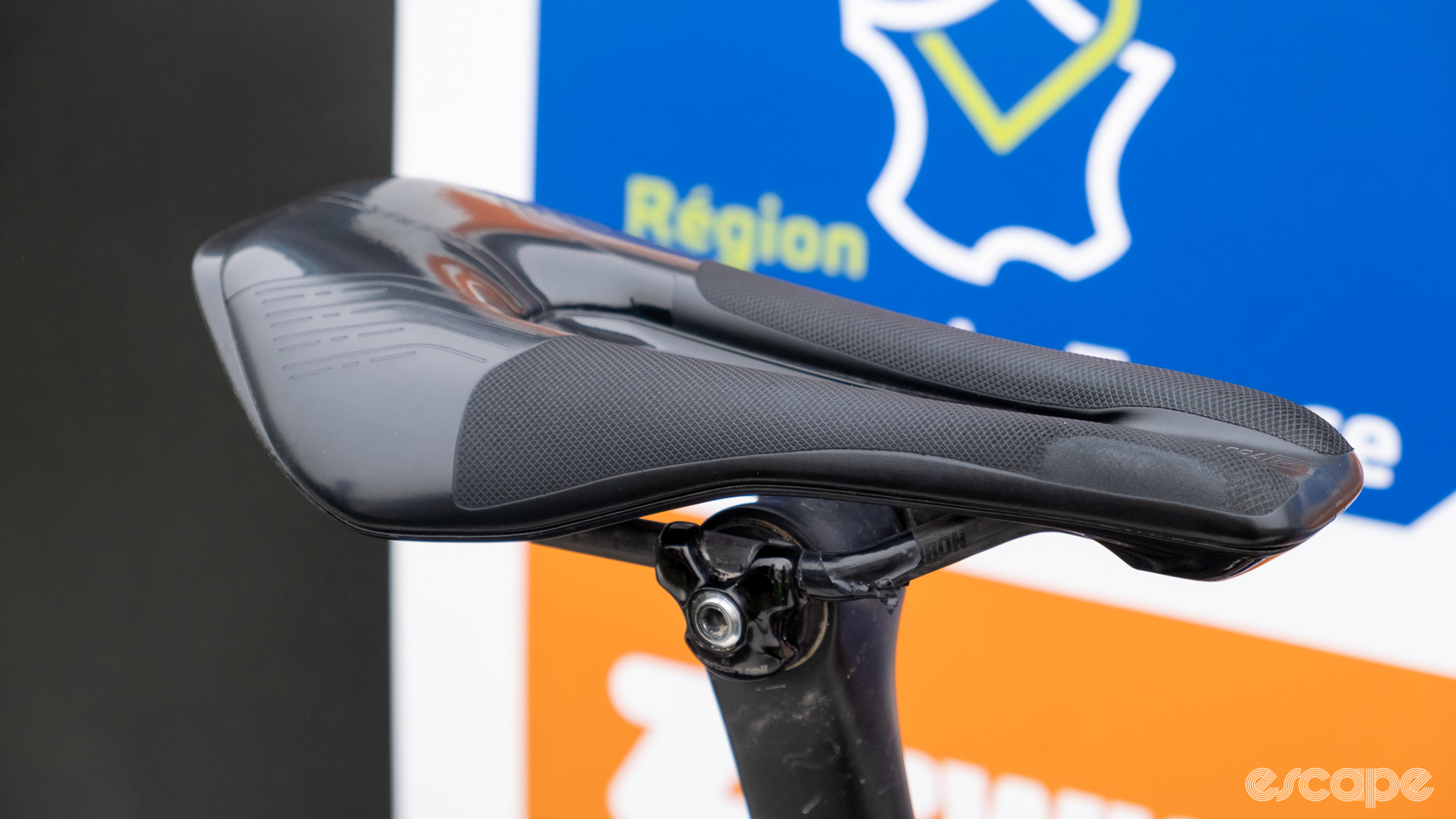 The image shows Lotte Kopecky's saddle