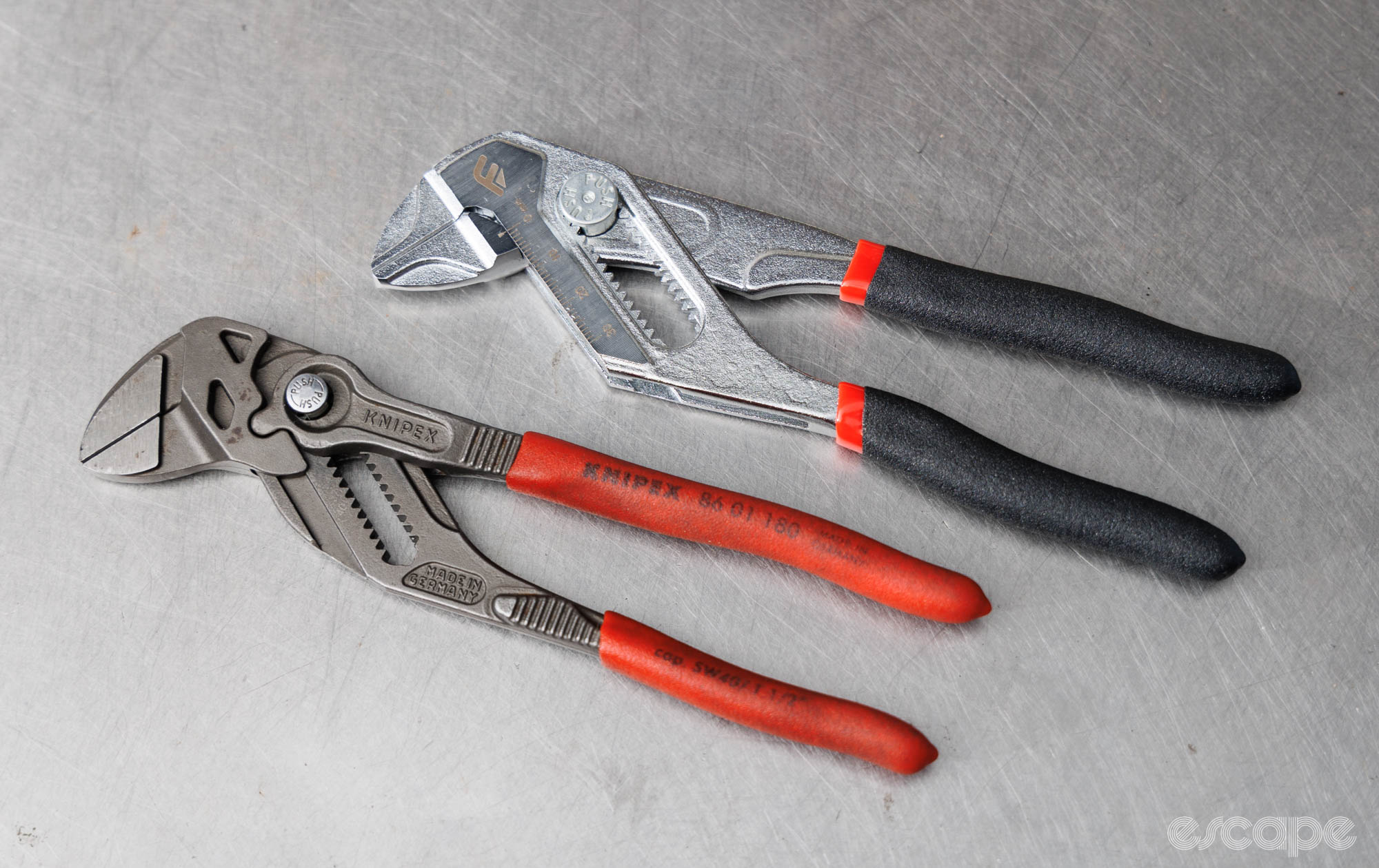 The Feedback Sports Pliers Wrench placed alongside the original Knipex version. 