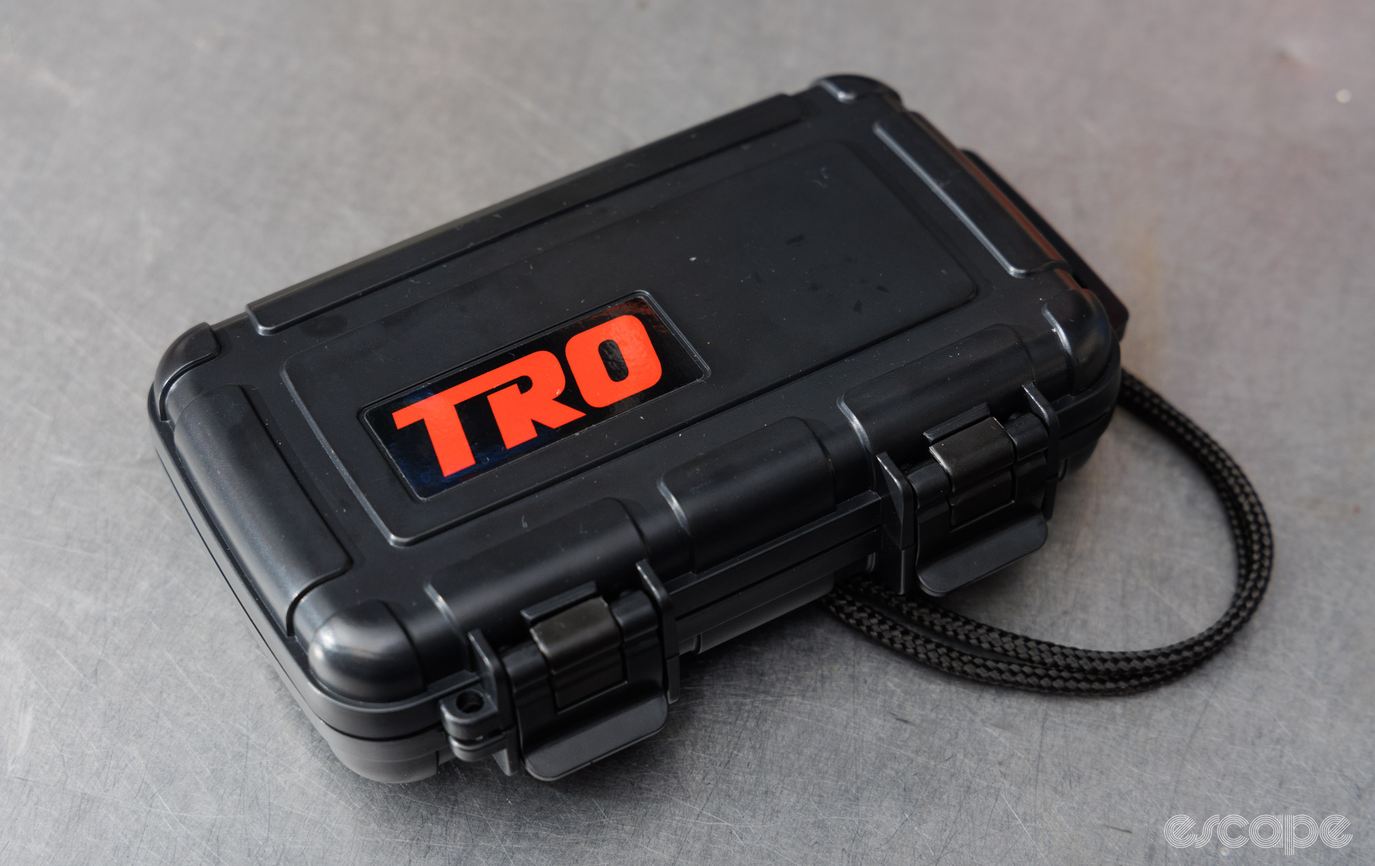 A small safe case with TRO branding on it. 