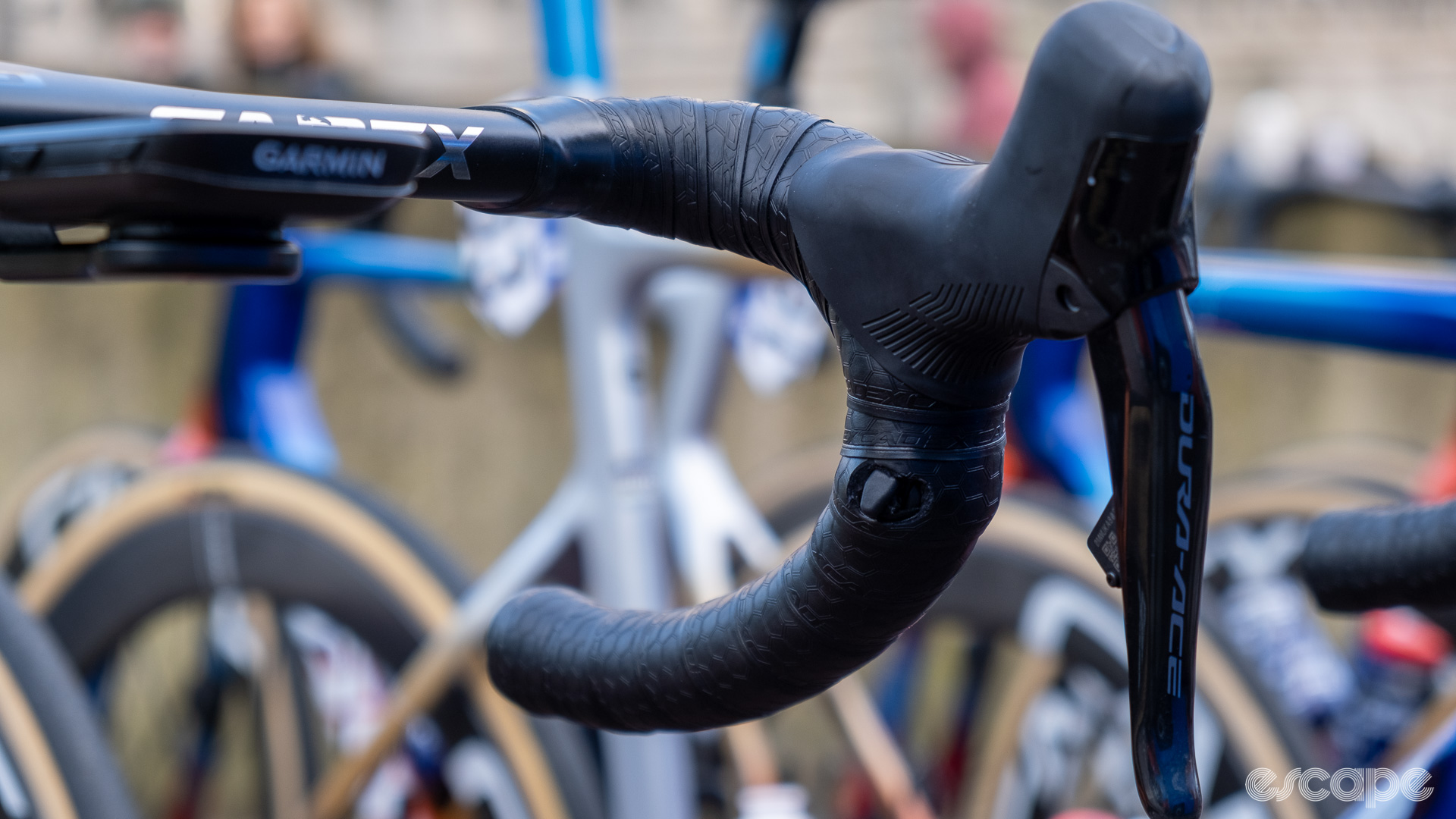 The image shows the satellite shifter on the inside of the handlebar drop.