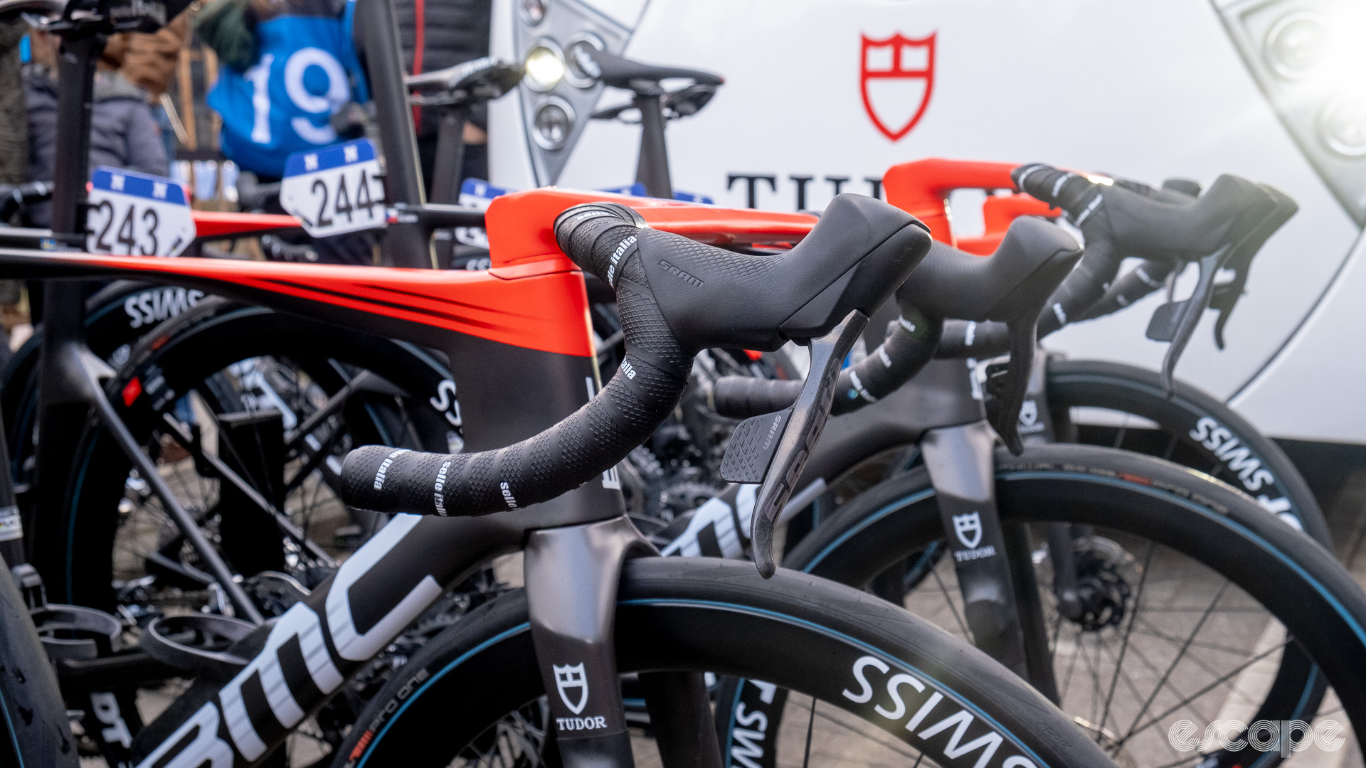 The image shows SRAM Red levers tilted inward and down on BMC handlebars