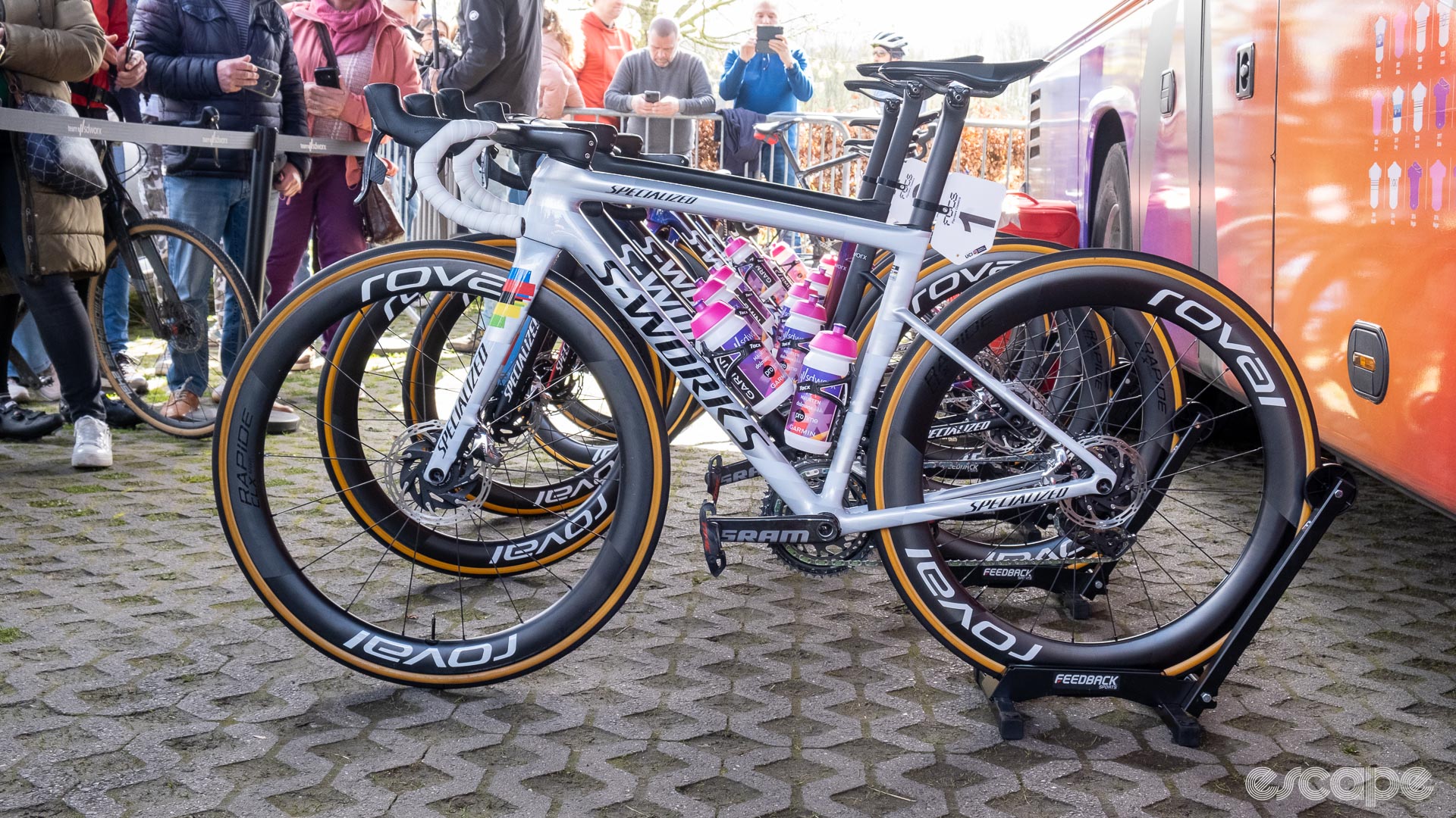 The image shows Lotte Kopecky's World Champion themed white and rainbow band Tarmac SL8.