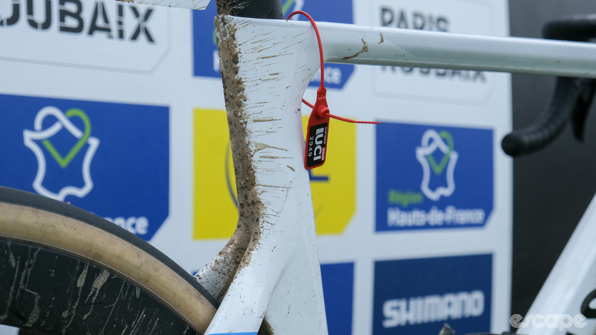 The image shows Mathieu van der Poel's Canyon Aeroad muddy seatpost