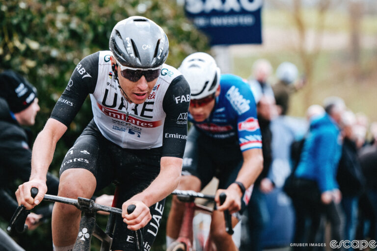 Tadej Pogačar leads Mathieu van der Poel on a climb in the 2023 Tour of Flanders.