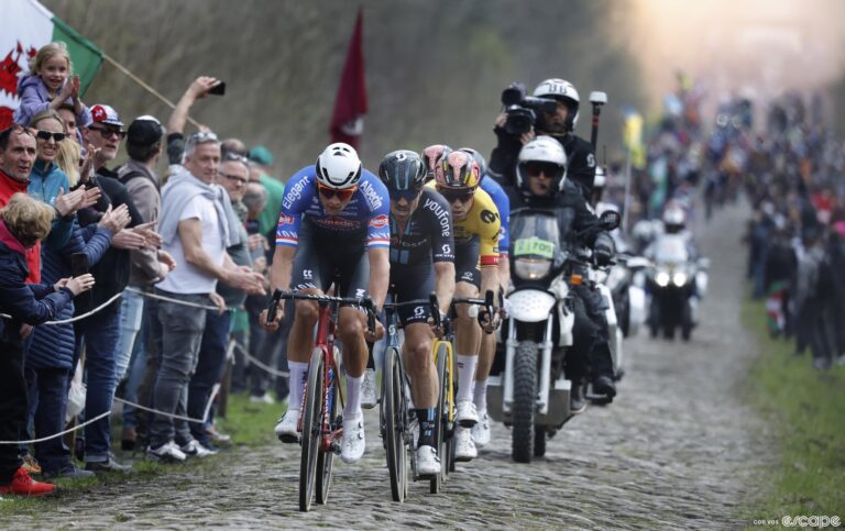 Mathieu van der Poel leads the way in the Arenberg trench.
