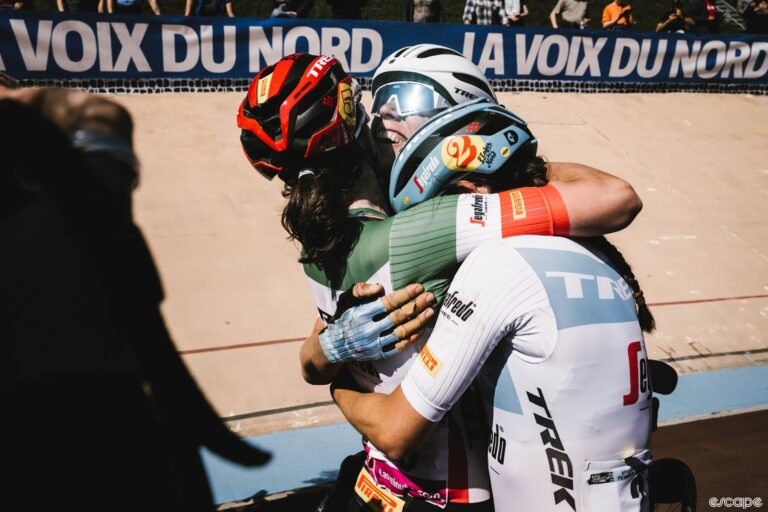 Elisa Longo Borghini hugs two of her teammates in the Velodrome in Roubiax