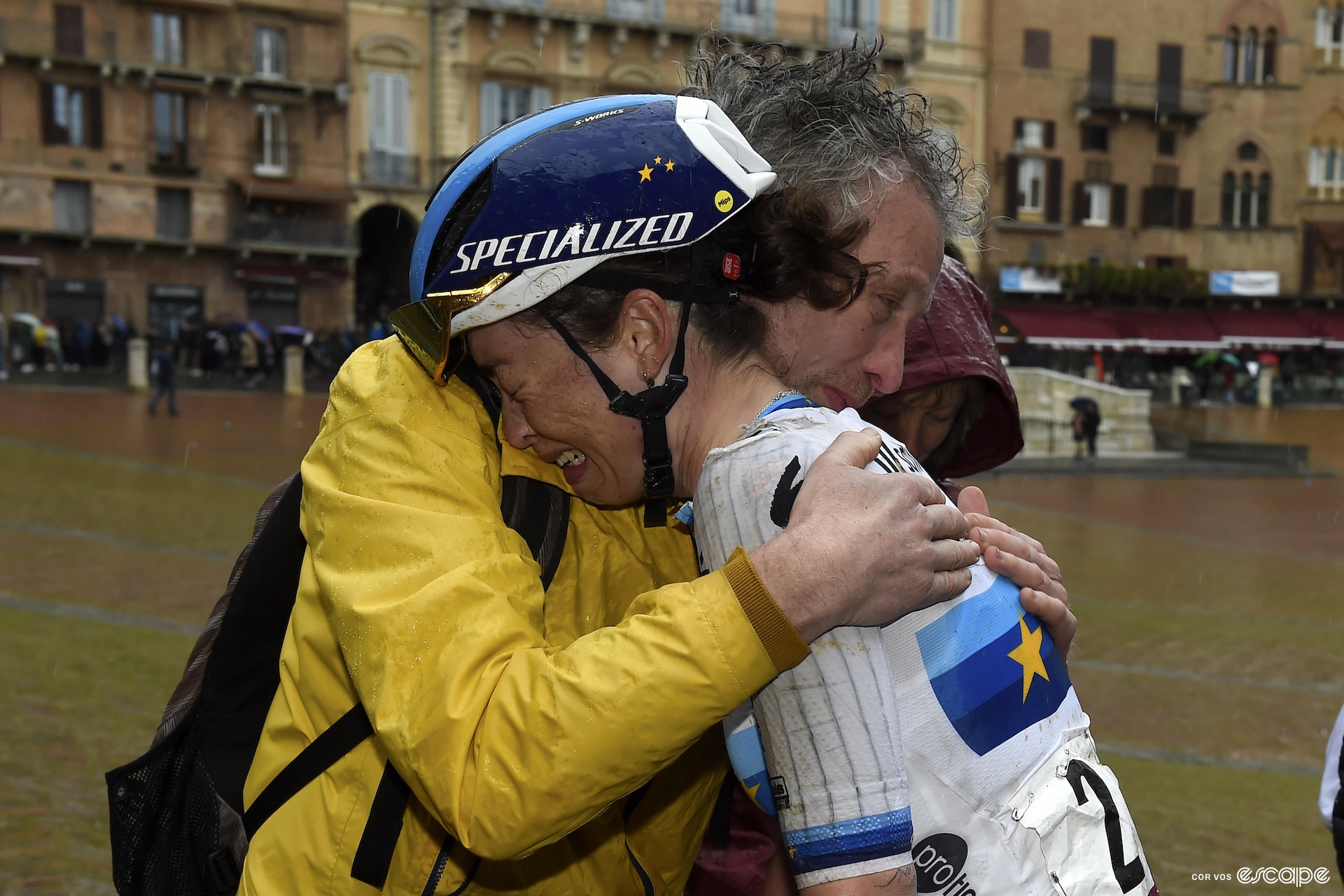 Mischa Bredewold cries into her fathers sholder at the end of a bike race. 